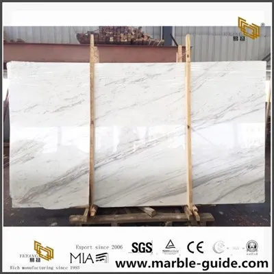 Volakas naturali tal-irħam abjad biċ-ċangaturi kbar