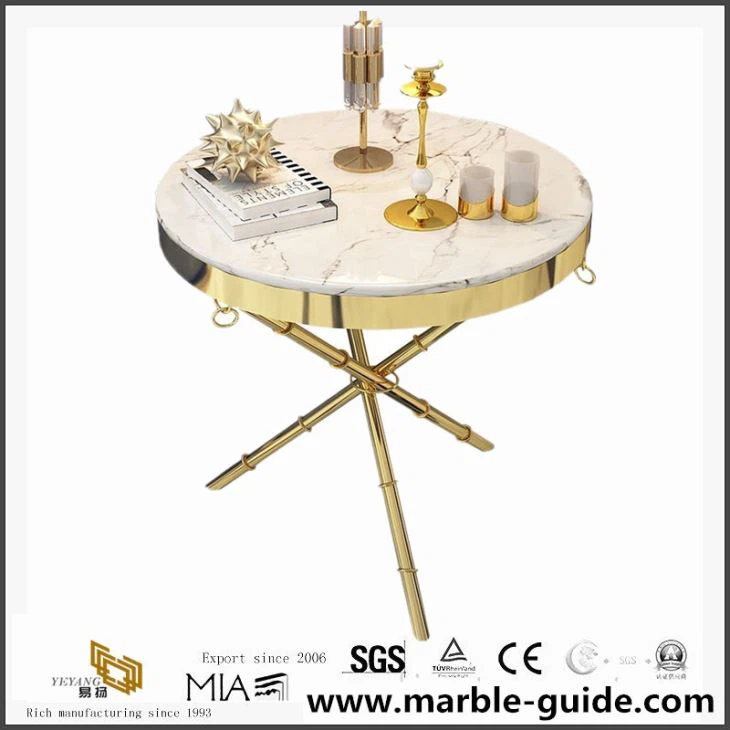 Top tal-mejda tal-irħam abjad